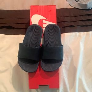 New with Box. Nike slides. Size 12c.